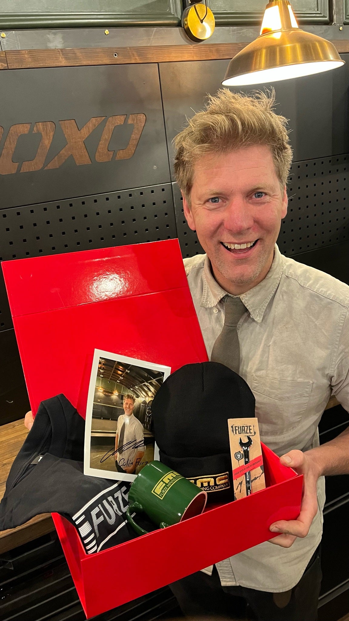 Colin Furze smiling with the open FMC Bundle box